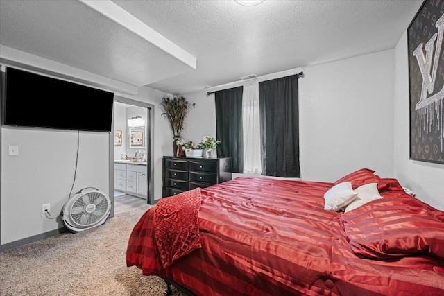 1430 Dacar St, Belle Fourche, SD 57717 - bedroom with carpet, ensuite bath, and a textured ceiling