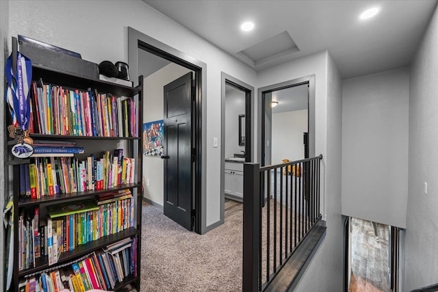 1430 Dacar St, Belle Fourche, SD 57717 - hallway featuring carpet flooring and baseboards