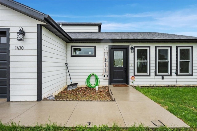 1430 Dacar St, Belle Fourche, SD 57717 - property entrance featuring a shingled roof