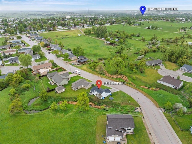 1430 Dacar St, Belle Fourche, SD 57717 - aerial view of property and surrounding area with nearby suburban area