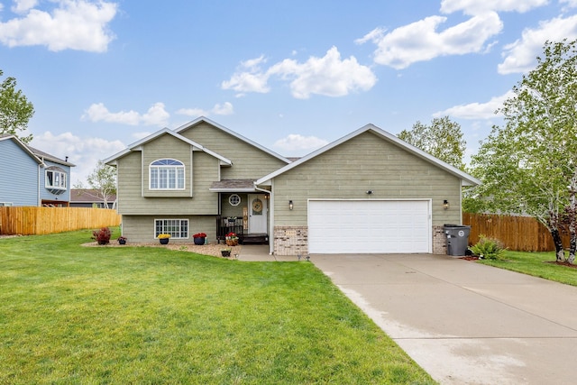 7350 Brighton St, Summerset, SD 57718 - split level home featuring a garage, driveway, and brick siding