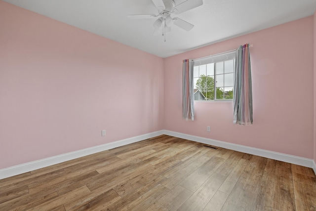 7350 Brighton St, Summerset, SD 57718 - empty room featuring baseboards, light wood-style floors, and a ceiling fan