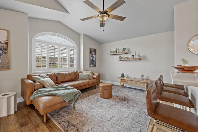 7350 Brighton St, Summerset, SD 57718 - living area featuring vaulted ceiling, ceiling fan, baseboards, and wood finished floors