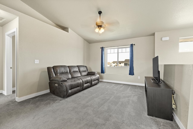 655 Bomber Way, Box Elder, SD 57719 - living room with a ceiling fan, carpet, vaulted ceiling, and baseboards