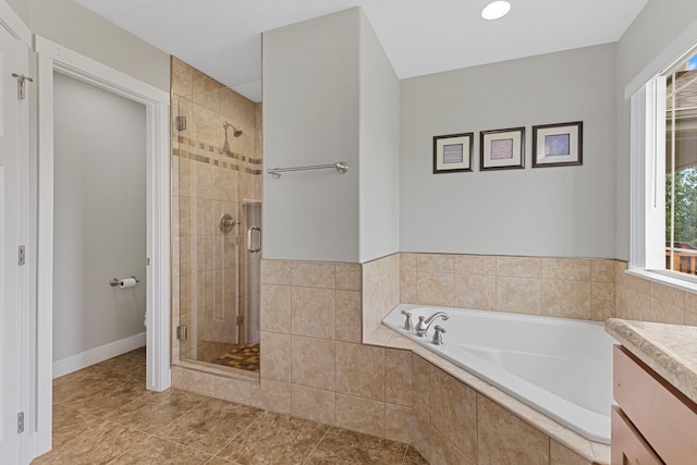 6212 Poppy Ct, Rapid City, SD 57702 - bathroom with a bath, a stall shower, vanity, and tile patterned floors