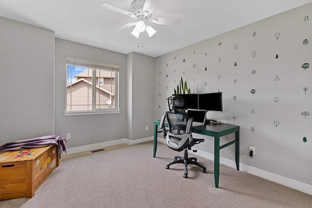 6212 Poppy Ct, Rapid City, SD 57702 - home office with baseboards, ceiling fan, and light colored carpet