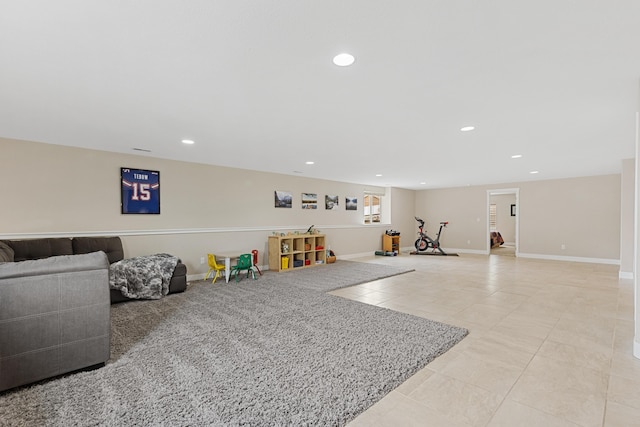 6212 Poppy Ct, Rapid City, SD 57702 - rec room with light tile patterned flooring, recessed lighting, and baseboards