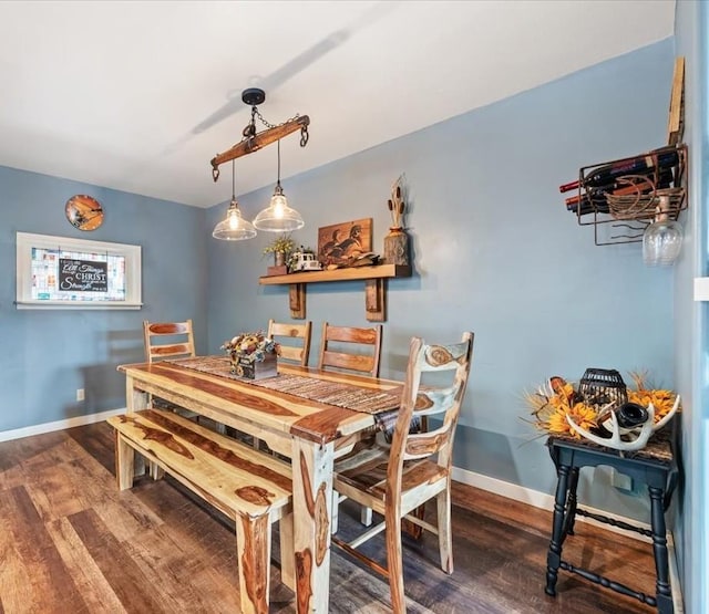 30 Adams St, Deadwood, SD 57732 - dining space with wood finished floors and baseboards
