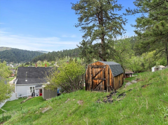 30 Adams St, Deadwood, SD 57732 - view of yard with a forest view and a mountain view
