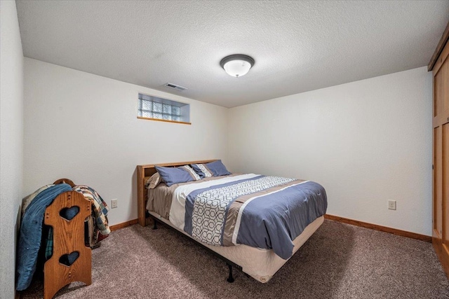 2315 Palisades Loop, Sturgis, SD 57785 - carpeted bedroom with a textured ceiling and baseboards