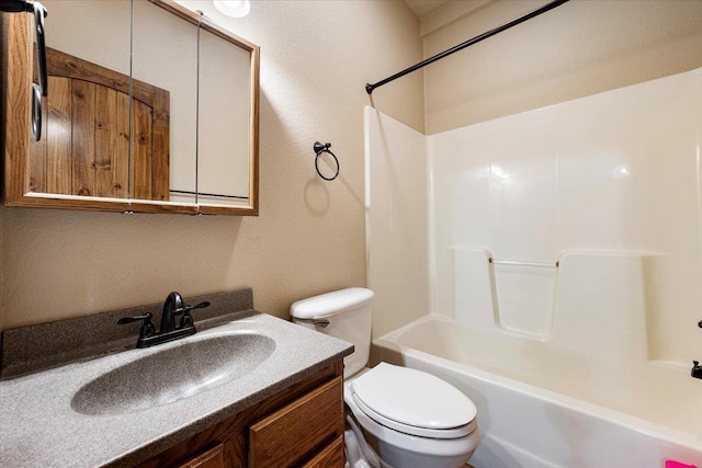2315 Palisades Loop, Sturgis, SD 57785 - bathroom featuring toilet, shower / tub combination, vanity, and a textured wall