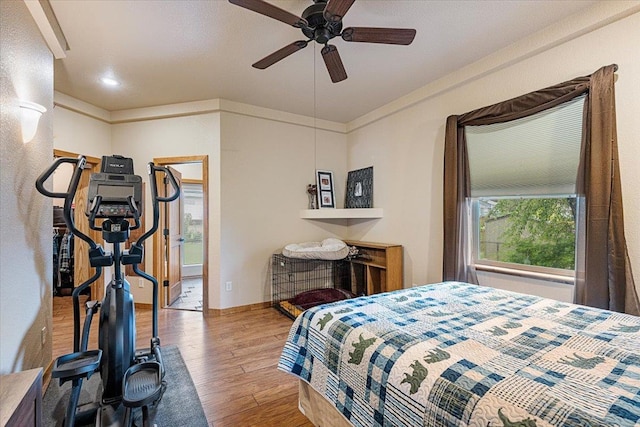 2315 Palisades Loop, Sturgis, SD 57785 - bedroom with wood finished floors, ceiling fan, and recessed lighting