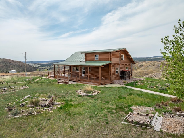 28013 Cascade Rd, Hot Springs, SD 57747 - back of property featuring metal roof and a garden