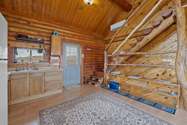 28013 Cascade Rd, Hot Springs, SD 57747 - kitchen with rustic walls, a sink, wooden ceiling, light countertops, and light wood-style floors