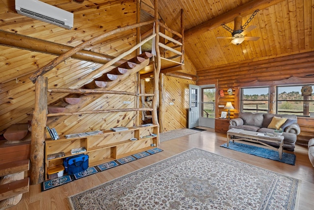 28013 Cascade Rd, Hot Springs, SD 57747 - living room with rustic walls, a ceiling fan, wood ceiling with exposed beams, high vaulted ceiling, and wood finished floors
