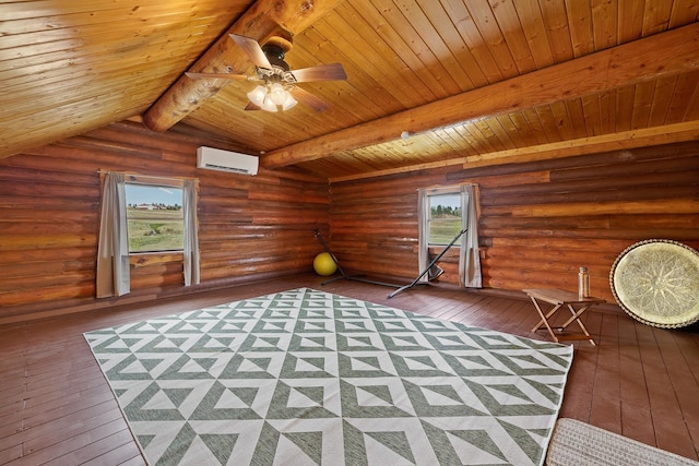28013 Cascade Rd, Hot Springs, SD 57747 - additional living space with a wall unit AC, wooden ceiling with exposed beams, hardwood / wood-style flooring, log walls, and ceiling fan