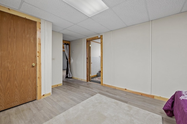 28013 Cascade Rd, Hot Springs, SD 57747 - unfurnished room featuring wood finished floors, a paneled ceiling, and baseboards