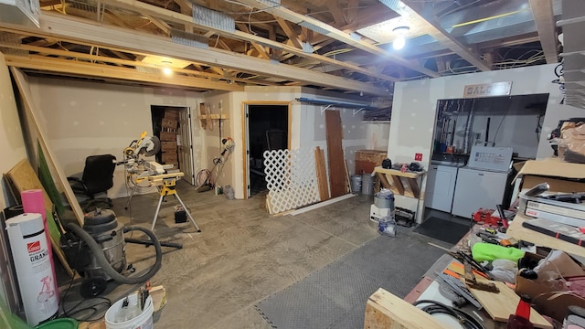 102 10th Ave, Belle Fourche, SD 57717 - unfinished below grade area with washer and clothes dryer