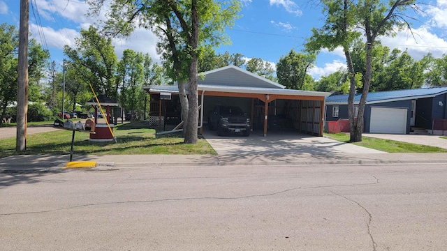 102 10th Ave, Belle Fourche, SD 57717 - view of front of house featuring concrete driveway
