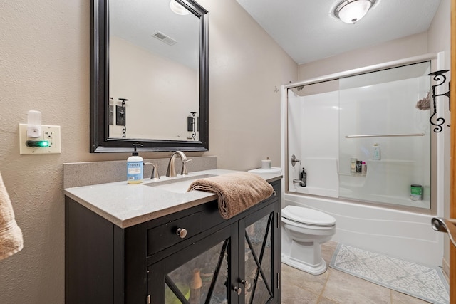 342 Enchantment Rd, Rapid City, SD 57701 - full bathroom with toilet, vanity, enclosed tub / shower combo, and tile patterned flooring
