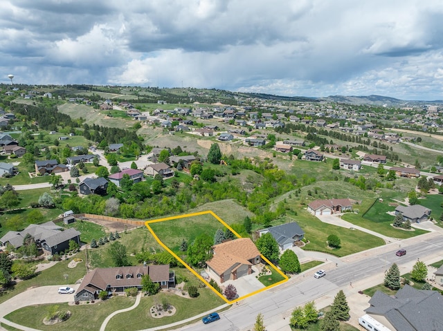 342 Enchantment Rd, Rapid City, SD 57701 - aerial view of residential area with property boundaries highlighted and a mountainous background