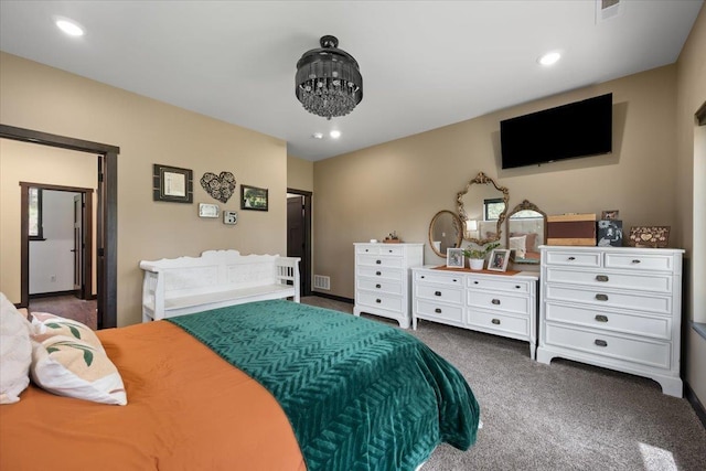3135 American Eagle Rd, Spearfish, SD 57783 - bedroom featuring dark carpet, a chandelier, and recessed lighting