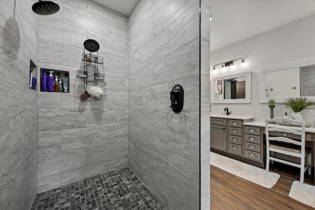 3135 American Eagle Rd, Spearfish, SD 57783 - full bath featuring wood finished floors, tiled shower, and vanity