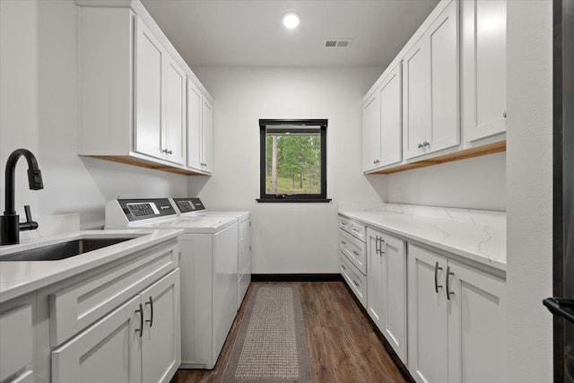 3135 American Eagle Rd, Spearfish, SD 57783 - laundry room featuring cabinet space, washer and dryer, dark wood-style floors, recessed lighting, and baseboards
