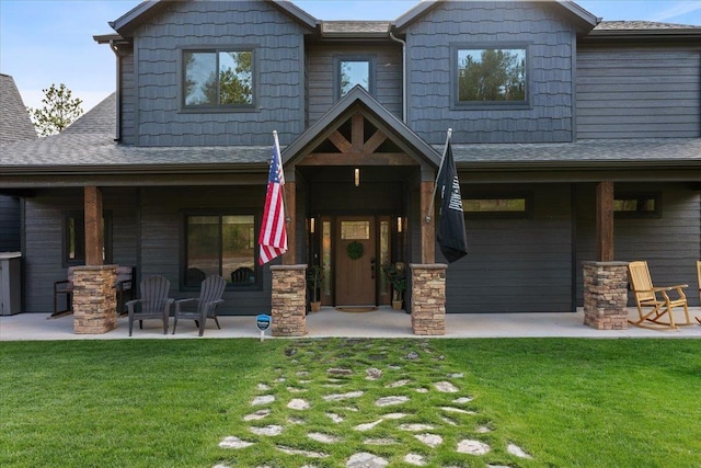 3135 American Eagle Rd, Spearfish, SD 57783 - craftsman house with a front lawn, a porch, and roof with shingles