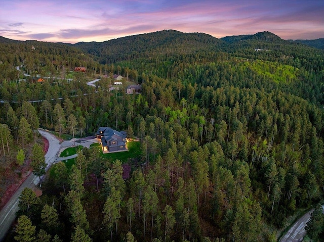 3135 American Eagle Rd, Spearfish, SD 57783 - view of property location featuring a heavily wooded area and a mountainous background