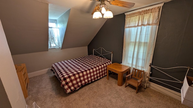 57 Lincoln Ave, Deadwood, SD 57732 - carpeted bedroom with vaulted ceiling, a ceiling fan, and baseboards