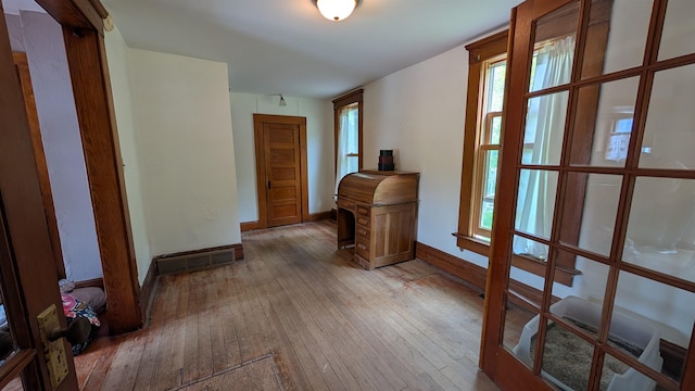 57 Lincoln Ave, Deadwood, SD 57732 - corridor featuring hardwood / wood-style floors and baseboards