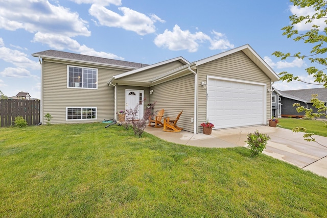 491 Freude Ln, Box Elder, SD 57719 - split level home with an attached garage and driveway