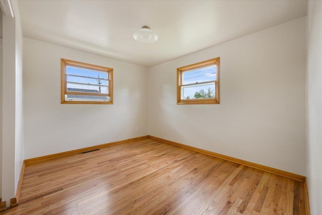 1041 State St, Spearfish, SD 57783 - unfurnished room featuring light wood finished floors and baseboards