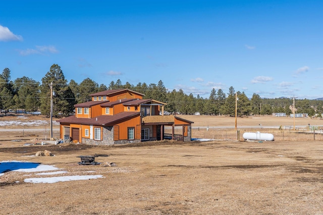 25426 Sidney Park Rd, Custer, SD 57730 - back of property featuring stone siding and board and batten siding