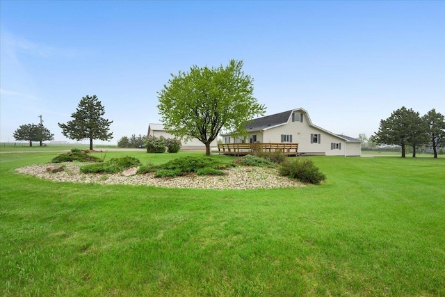 821 N Rainbow Rd, Spearfish, SD 57783 - view of grassy yard with a deck