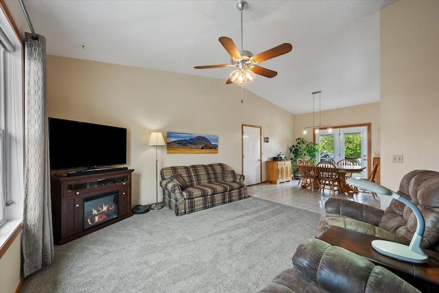 1006 S 33rd St, Spearfish, SD 57783 - carpeted living area featuring lofted ceiling, ceiling fan, and tile patterned flooring