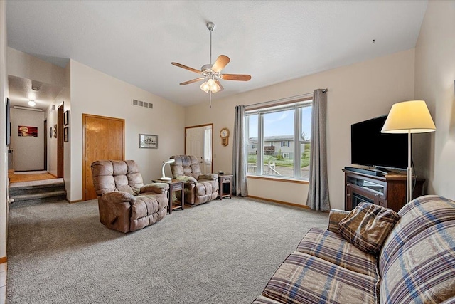1006 S 33rd St, Spearfish, SD 57783 - living room featuring lofted ceiling, carpet, a ceiling fan, and baseboards