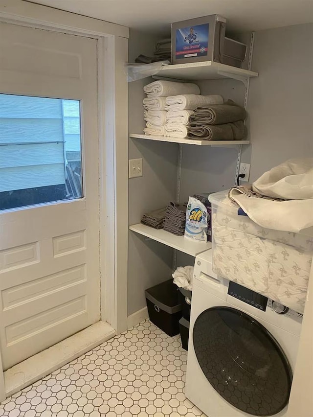 121 S Stone St, Lead, SD 57754 - laundry room with washer / clothes dryer and baseboards
