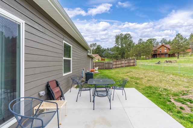151 Surrey Ln, Custer, SD 57730 - view of patio / terrace with outdoor dining area and central air condition unit