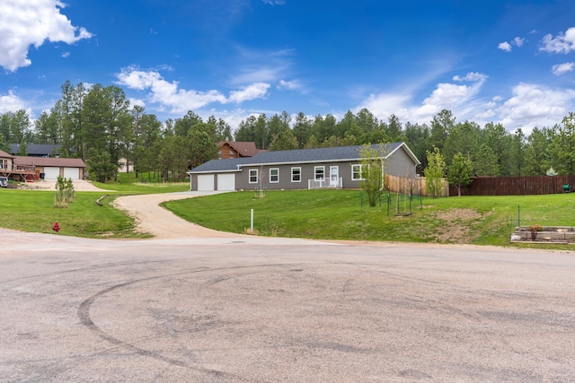 151 Surrey Ln, Custer, SD 57730 - ranch-style house with driveway and a garage