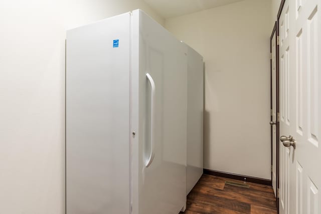 151 Surrey Ln, Custer, SD 57730 - laundry area featuring dark wood-type flooring and washing machine and dryer