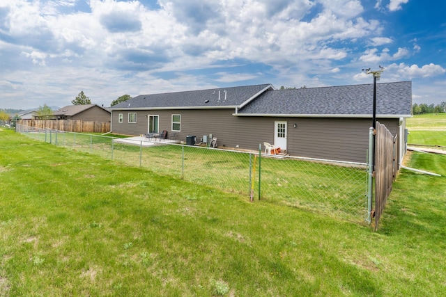 151 Surrey Ln, Custer, SD 57730 - back of house with central AC and a patio area