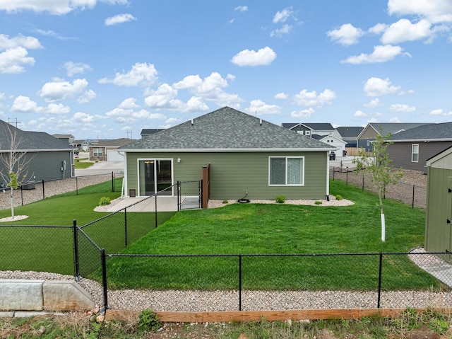 516 Aaron Ct, Rapid City, SD 57703 - back of house featuring a gate, roof with shingles, and a residential view