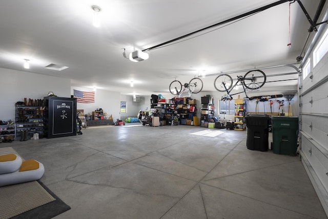2259 Suntory Ave, Spearfish, SD 57783 - garage featuring a workshop area and a garage door opener