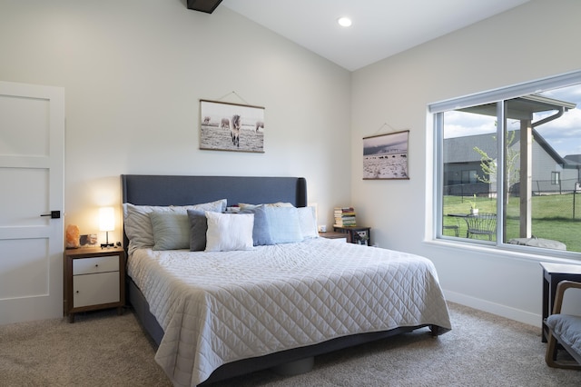 2259 Suntory Ave, Spearfish, SD 57783 - bedroom featuring light carpet, multiple windows, vaulted ceiling, baseboards, and recessed lighting