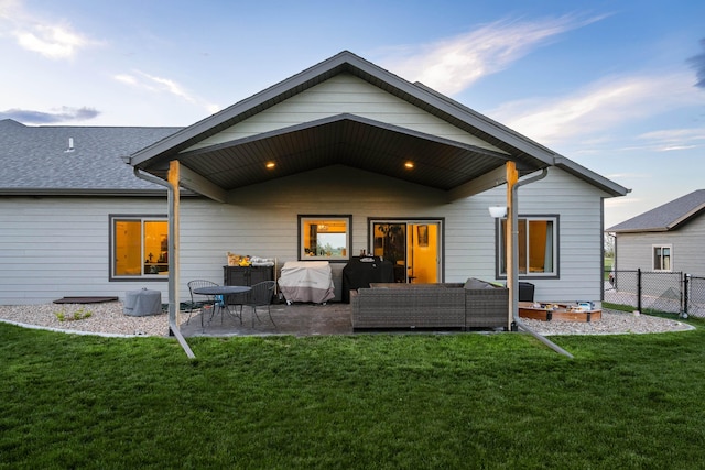 2259 Suntory Ave, Spearfish, SD 57783 - rear view of property featuring a patio area, outdoor lounge area, and roof with shingles