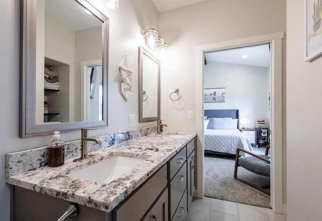 2259 Suntory Ave, Spearfish, SD 57783 - full bathroom featuring tile patterned flooring, ensuite bath, and double vanity
