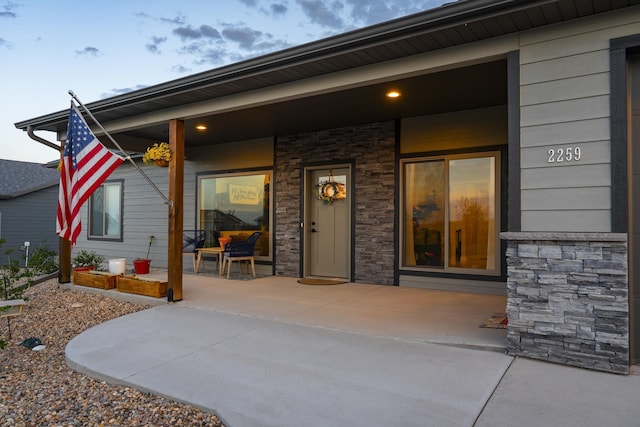2259 Suntory Ave, Spearfish, SD 57783 - property entrance with stone siding and a porch