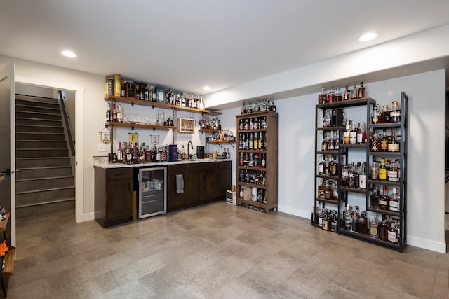 2259 Suntory Ave, Spearfish, SD 57783 - indoor wet bar with beverage cooler, stairway, recessed lighting, and baseboards